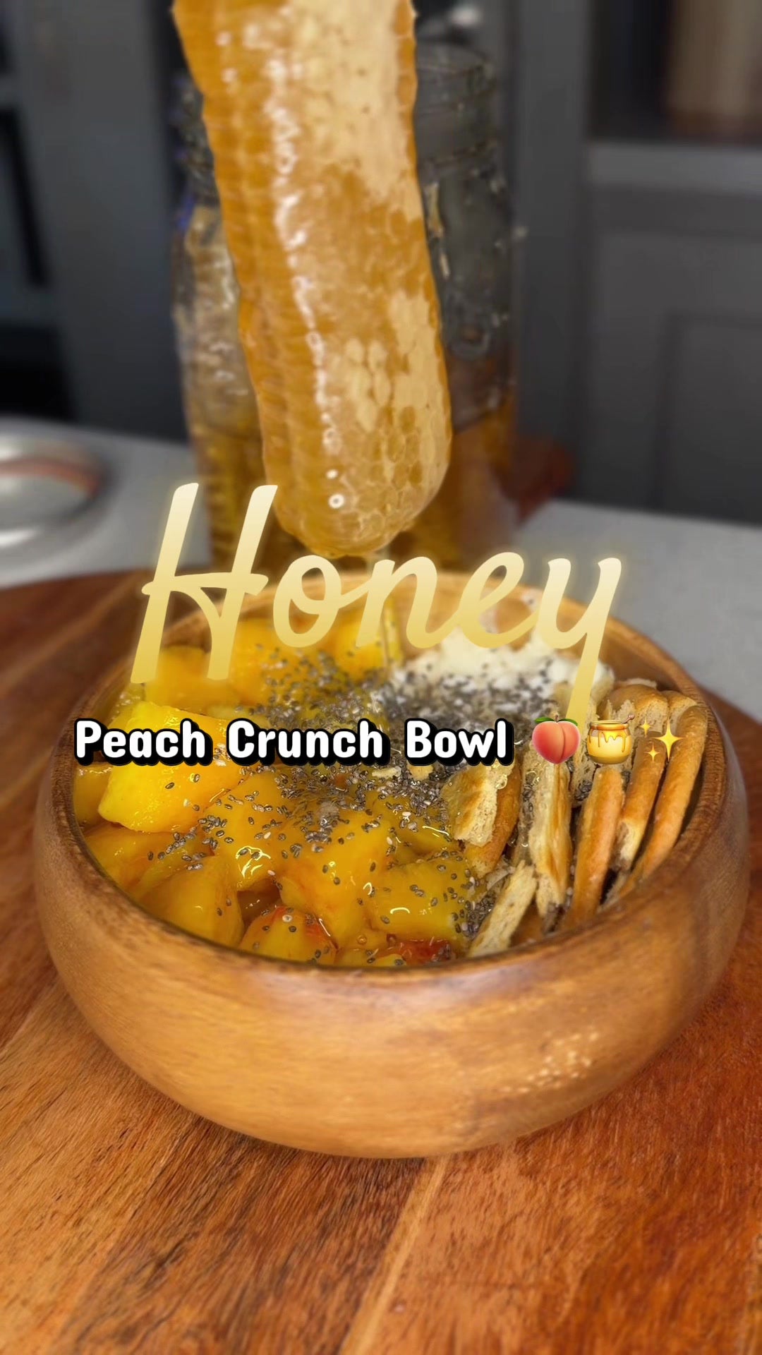 Peach honey crunch bowl with cottage cheese, chia seeds, cookie crumbs, and honeycomb